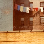 Clothes Hanging Outside Apartment Building