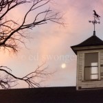 Barn Weather Vane at Sunset