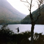 Fisherman in Mountain Lake