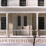 White Frame House in Snow Enhanced
