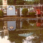 Pool Reflected in Rain Puddle