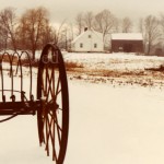 House, Barn and Wheel in Winter